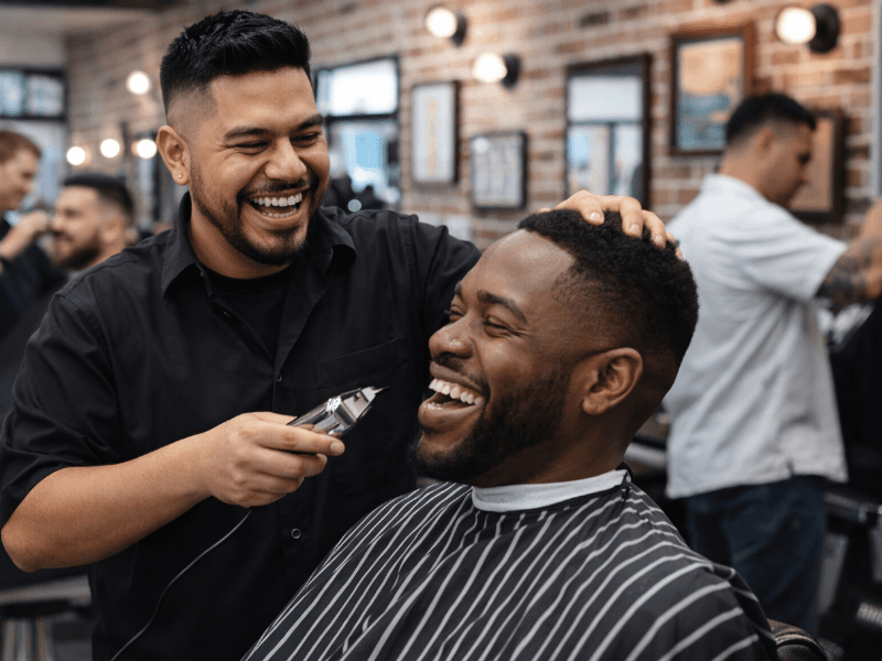 Barber cutting a client's hair